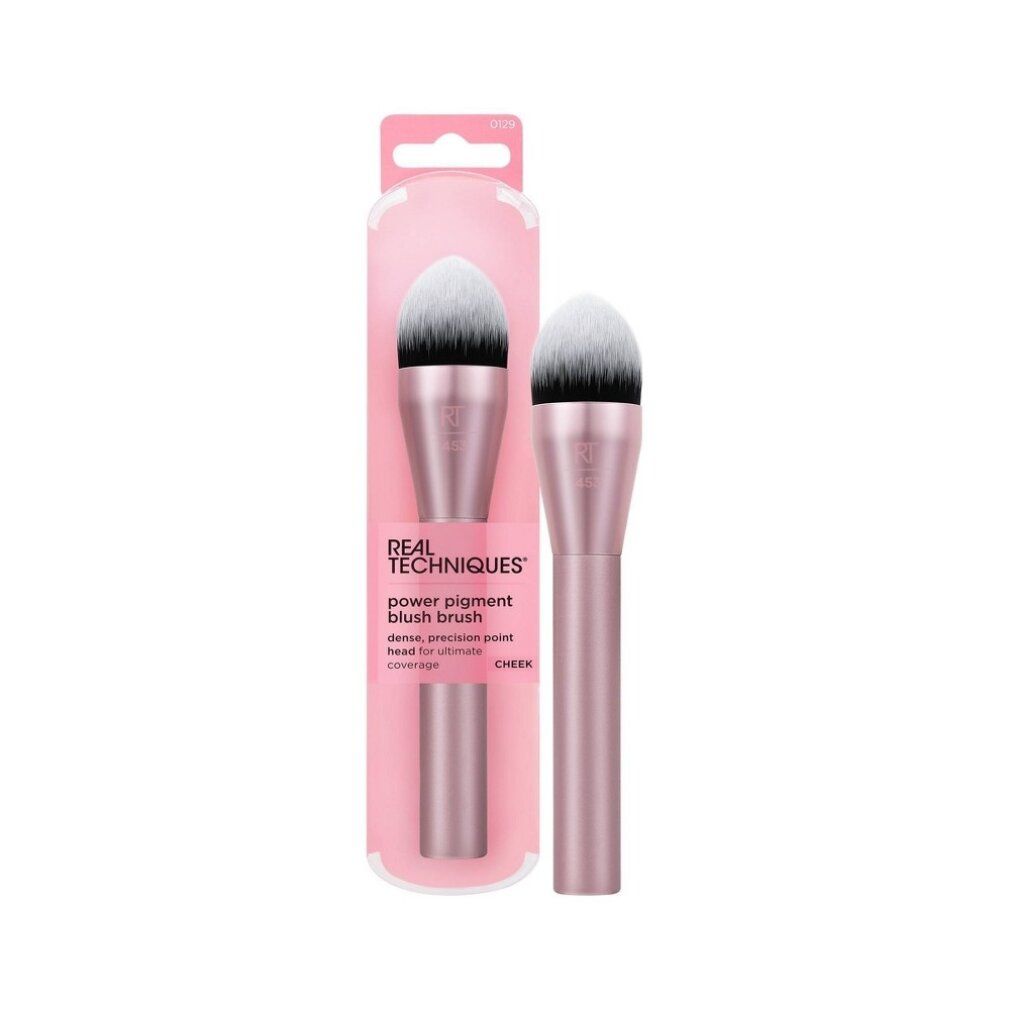 Due pennelli per blush in una confezione rosa. Sulla confezione sono presenti le scritte "Real Techniques" e "power pigment blush brush".