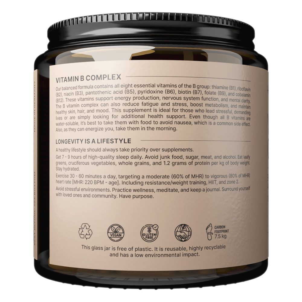 Barattolo di vetro con etichetta Vitamina B Complesso. Include simboli di riciclo, vegan e impronta di carbonio.