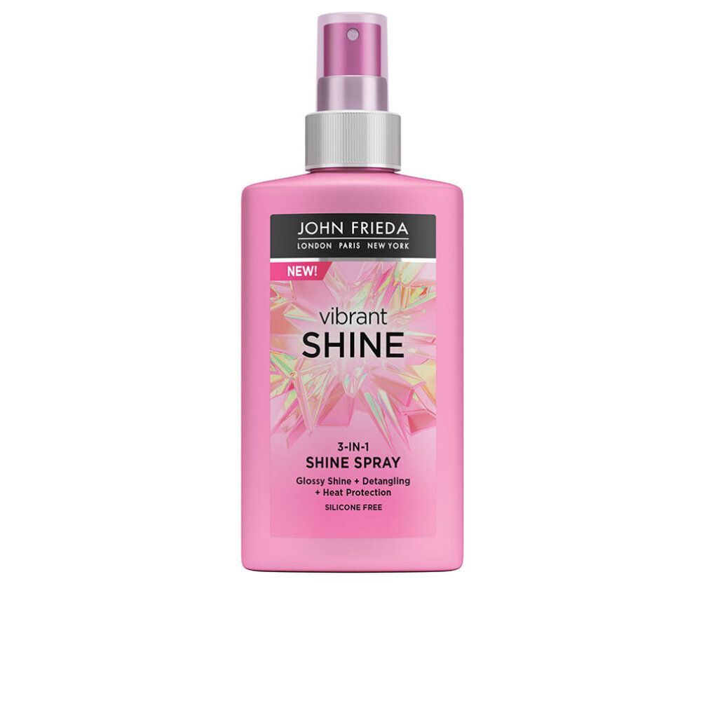 Flacone rosa con vaporizzatore. Scritta: John Frieda, Vibrant Shine, 3-in-1 Shine Spray. Lucentezza, districante, protezione termica. Senza silicone.