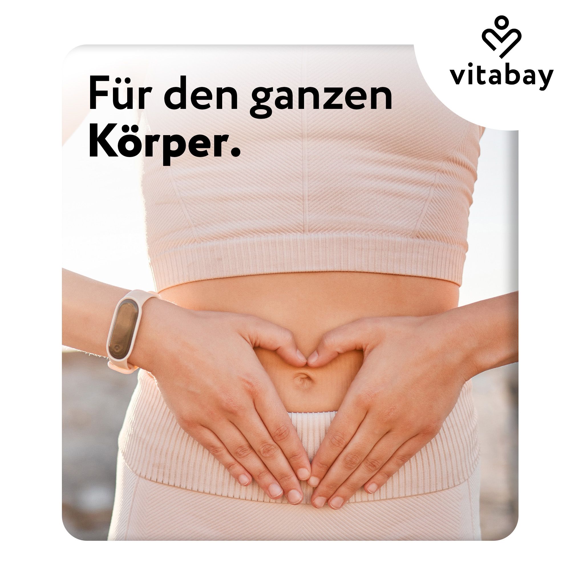 Persona con le mani a forma di cuore sulla pancia. Testo: Per tutto il corpo. Orologio da polso al polso.