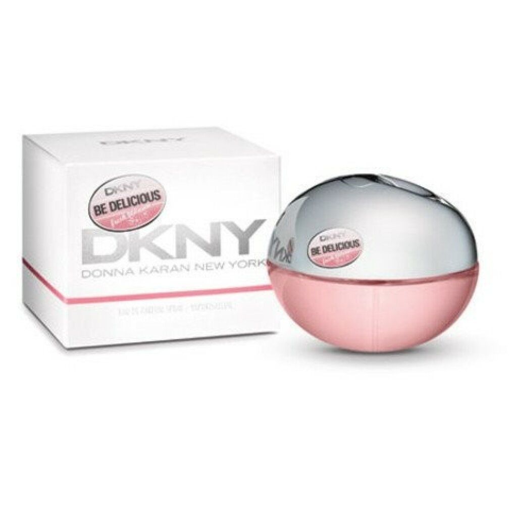 Flacone rotondo con tappo argentato e liquido rosa. Accanto, scatola bianca con logo DKNY.