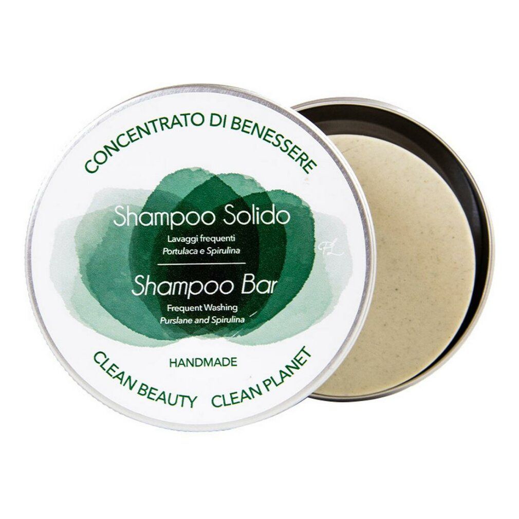 Confezione rotonda di shampoo solido. Scritta: Shampoo Solido, Lavaggi frequenti, Portulaca e Spirulina. Coperchio aperto.