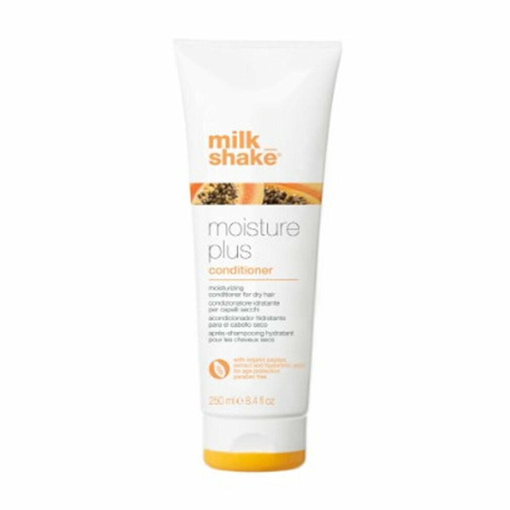Tubo bianco con tappo arancione. Scritta: milk_shake moisture plus conditioner. Testo multilingue.
