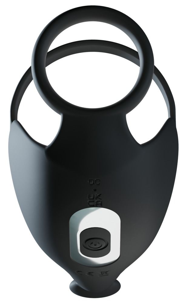 Anello per pene e scroto nero. Il prodotto ha una forma rotonda e una forma curva. È realizzato in materiale morbido.