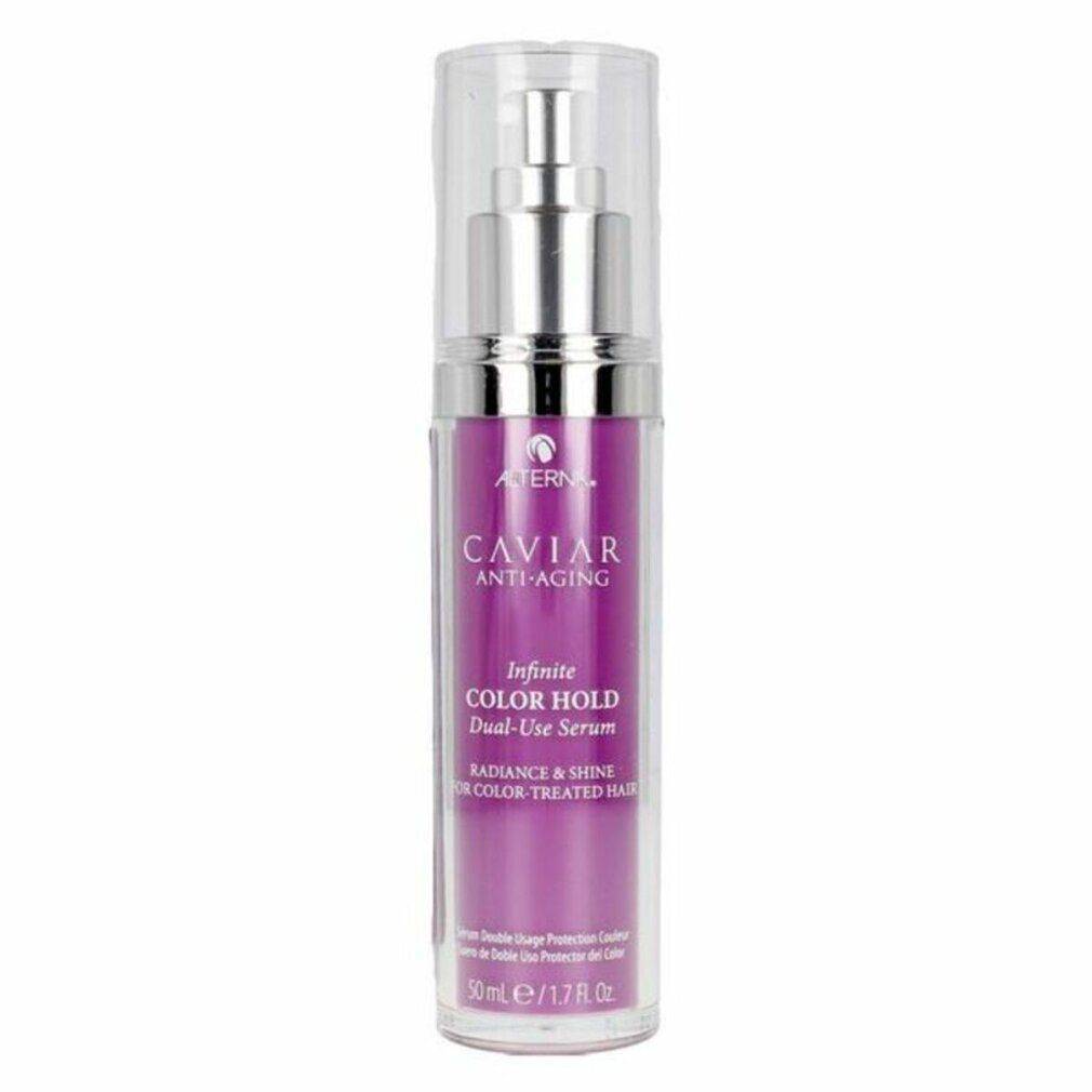 Flacone di siero con pompa argentata e liquido viola. Scritta: Caviar Anti-Aging, Infinite Color Hold Dual-Use Serum.