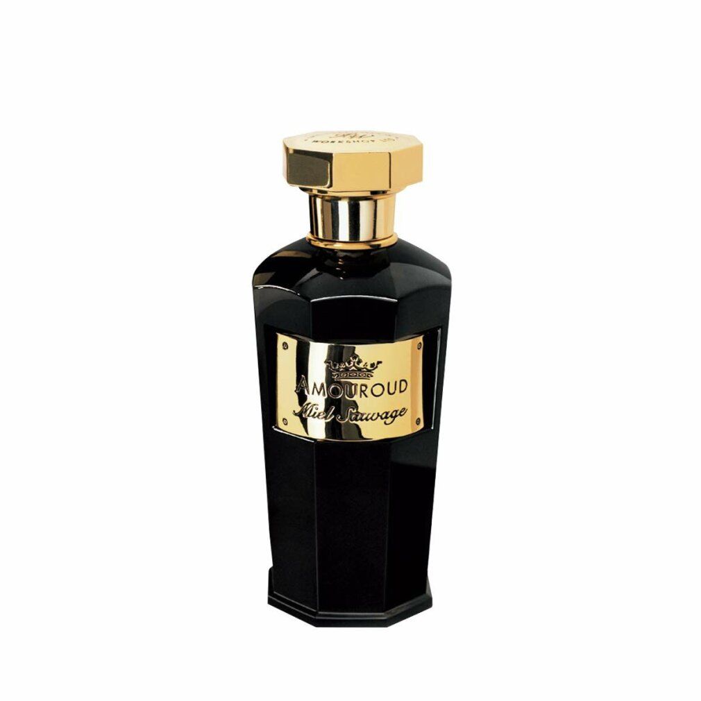 Flacone nero con tappo ed etichetta dorati. Testo: Amouroud Miel Sauvage.