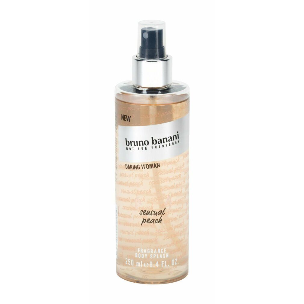 Spray corpo trasparente. Scritta: bruno banani Daring Woman Sensual Peach. Tappo argento. Etichetta beige.