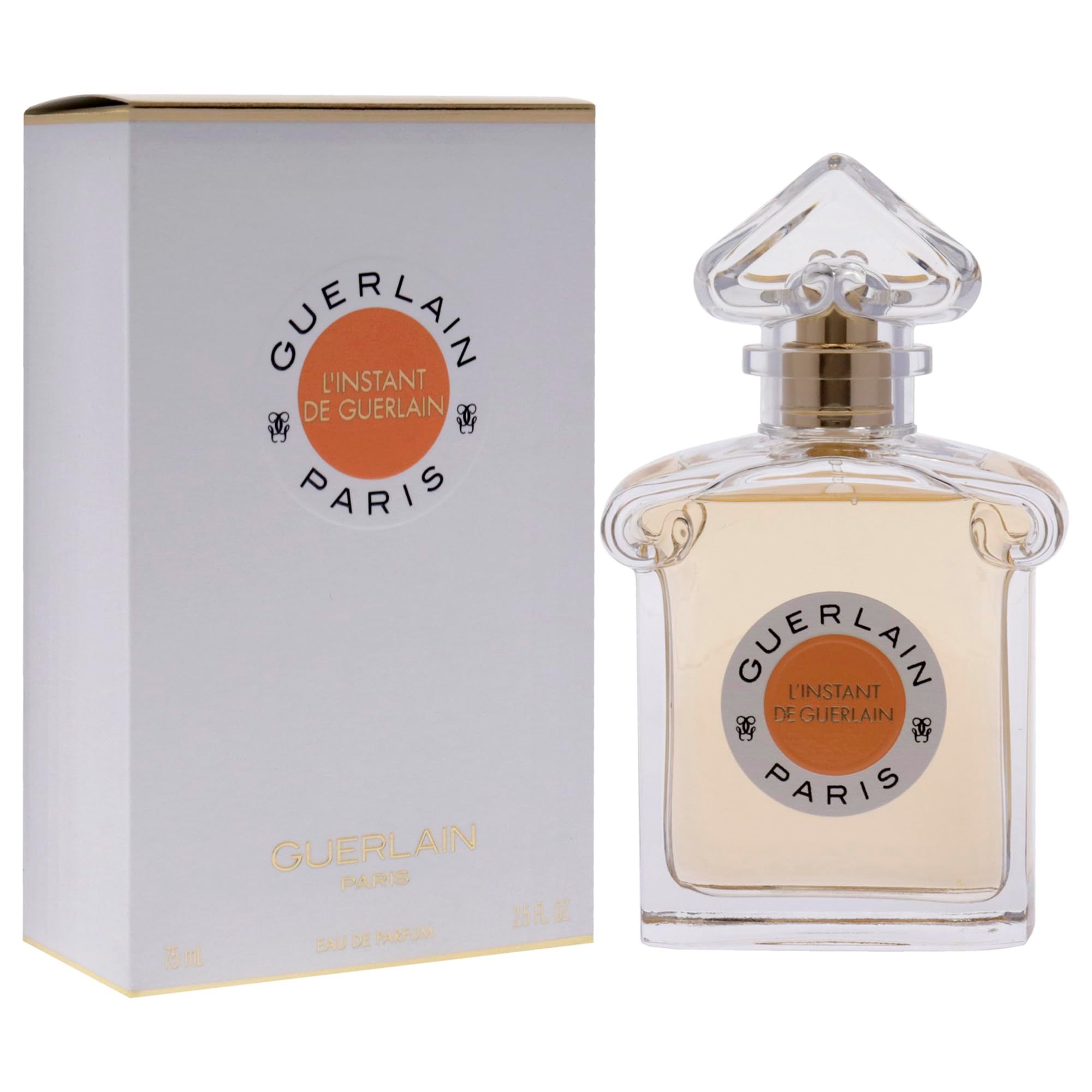 Flacone e confezione. Sulla confezione è scritto "L'Instant de Guerlain Paris".