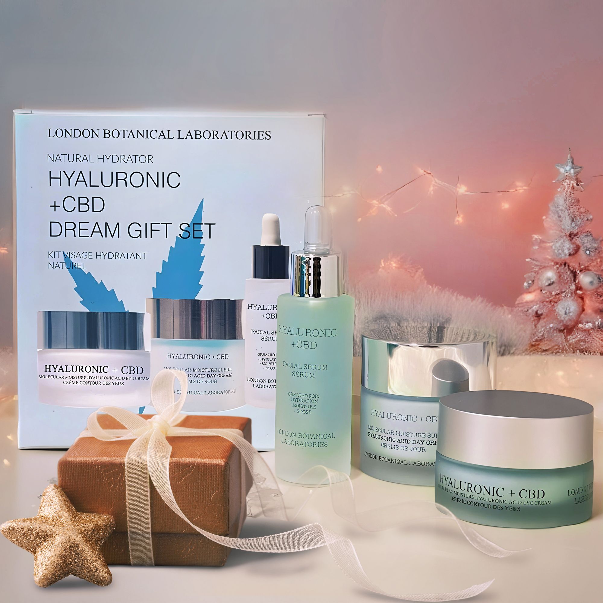 Set regalo London Botanical Laboratories Hyaluronic + CBD con crema viso, contorno occhi e siero, decorato per Natale.
