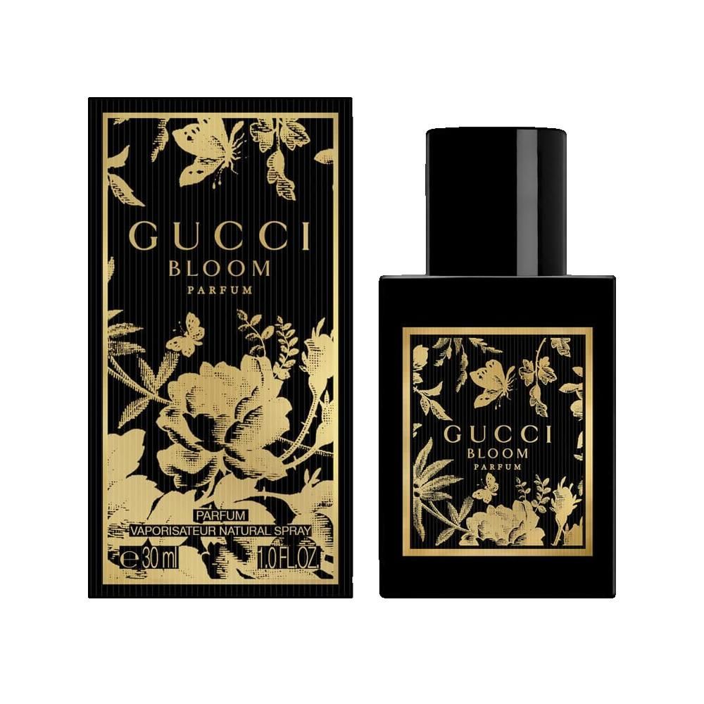 Flacone e scatola neri. Scritta: Gucci Bloom Parfum. Ornamenti dorati. Flacone con tappo nero.
