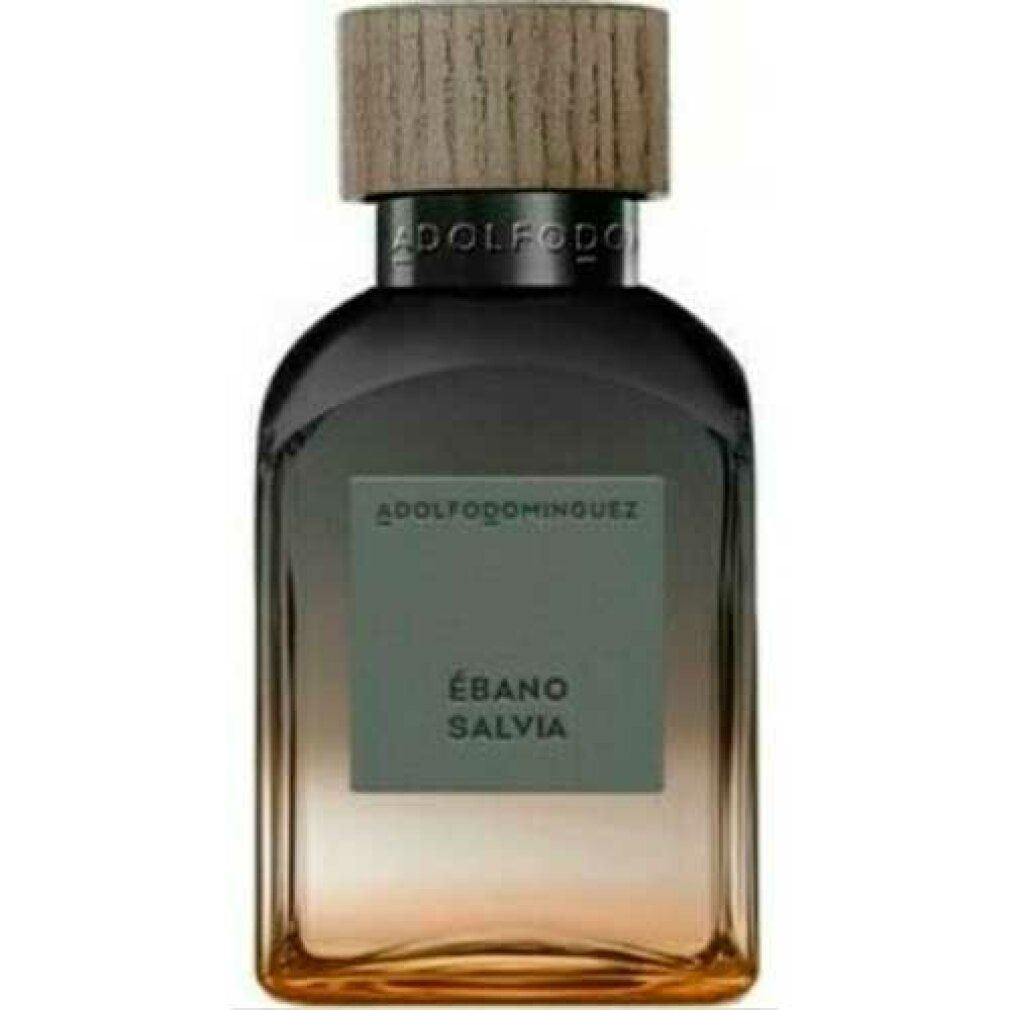Flacone di profumo con tappo in legno. Scritta: Ébano Salvia, Adolfo Dominguez. Sfumatura dal marrone al rosa.