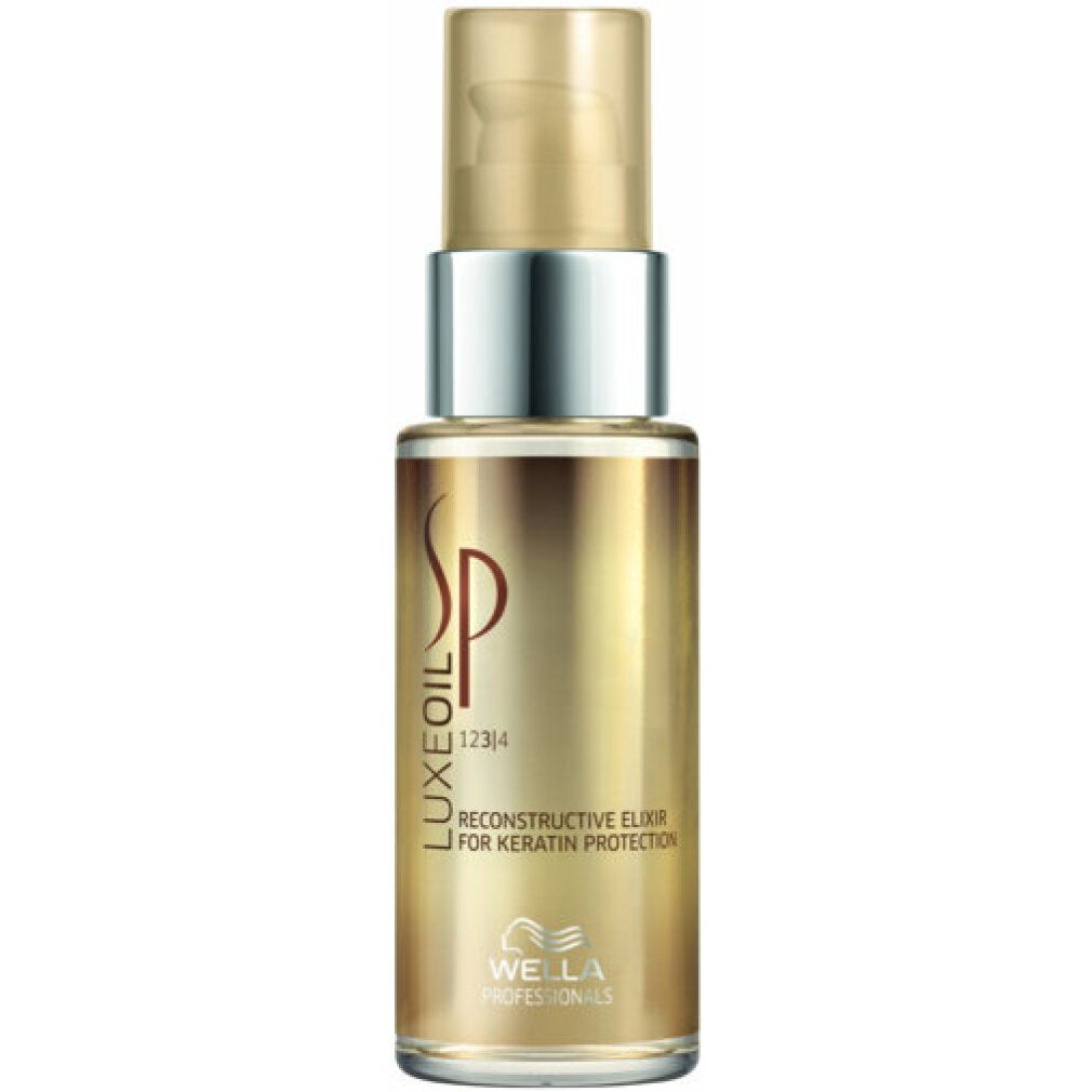 Flacone dorato con tappo argentato. Scritta: SP LuxeOil Reconstructive Elixir. Marchio: Wella Professionals.