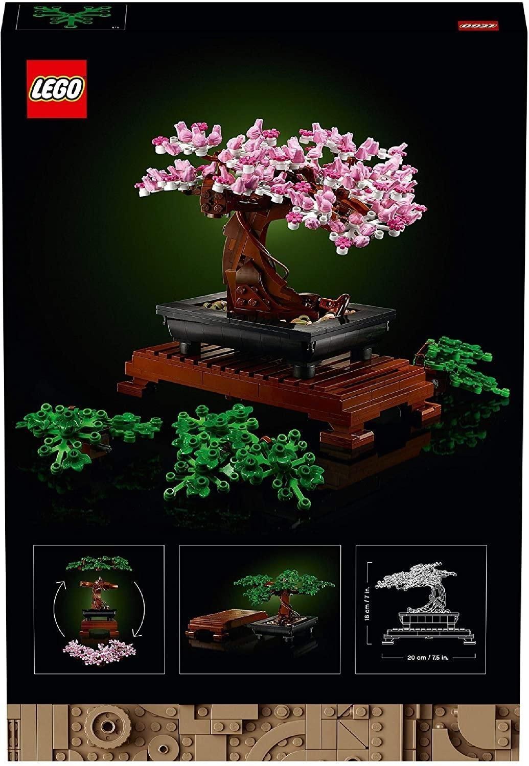 Retro della confezione con modello di albero bonsai. Il modello ha fiori rosa, tronco marrone e vaso nero su supporto marrone.