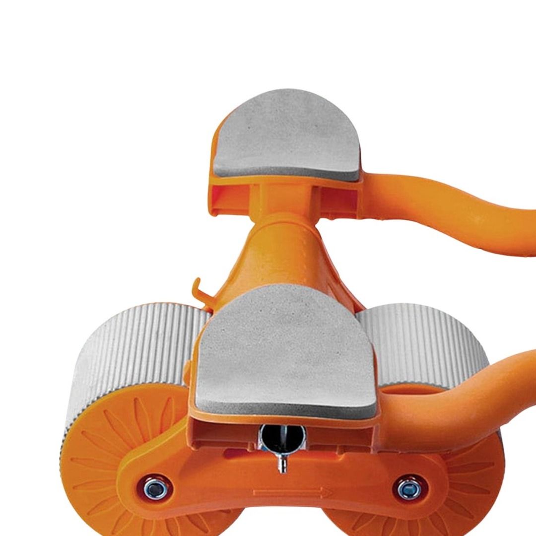 Primo piano della ruota per addominali. Telaio arancione, cuscinetti e rulli grigi. Vista dettagliata della costruzione.