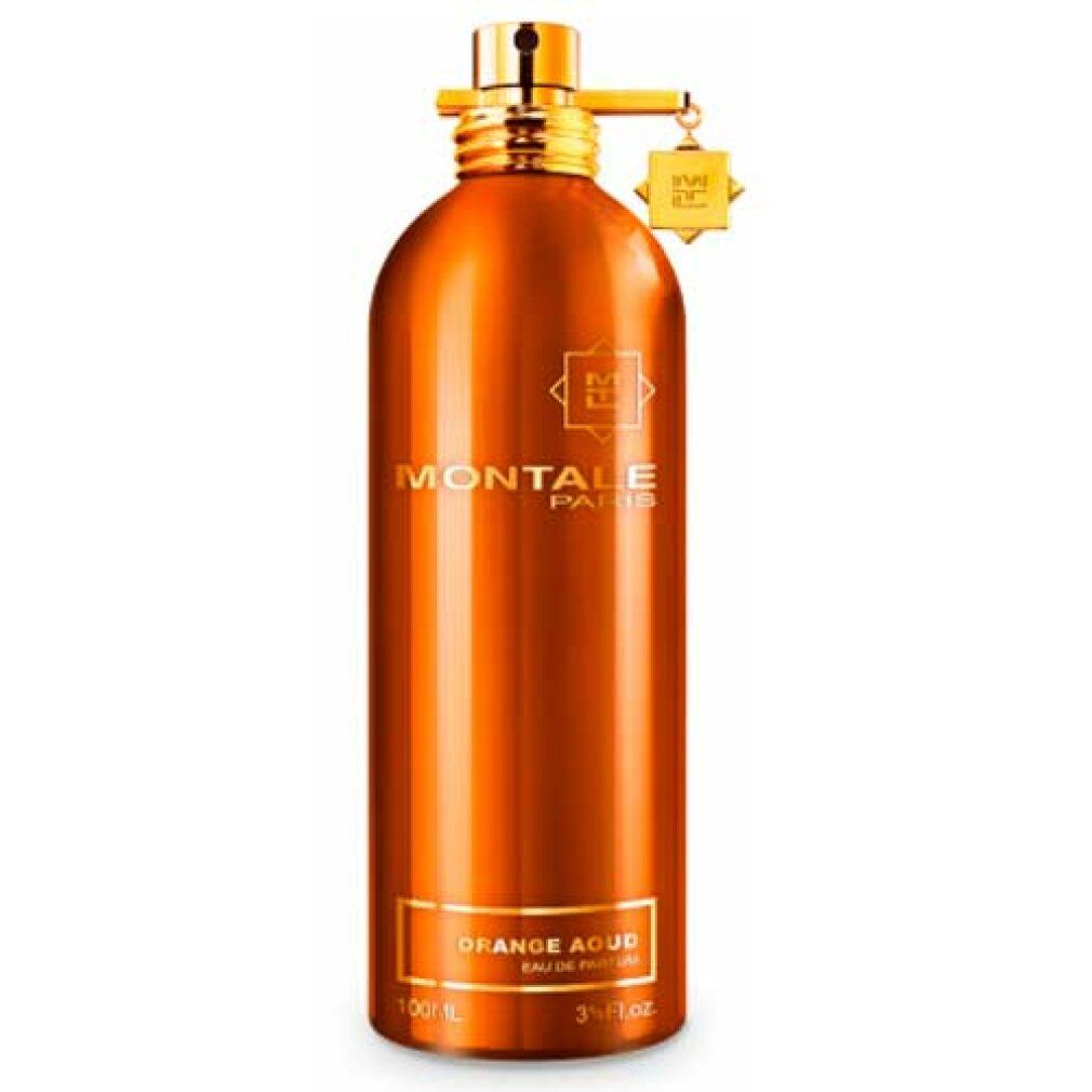 Flacone di profumo arancione con tappo dorato e ciondolo. Scritte: Montale Paris, Orange Aoud.