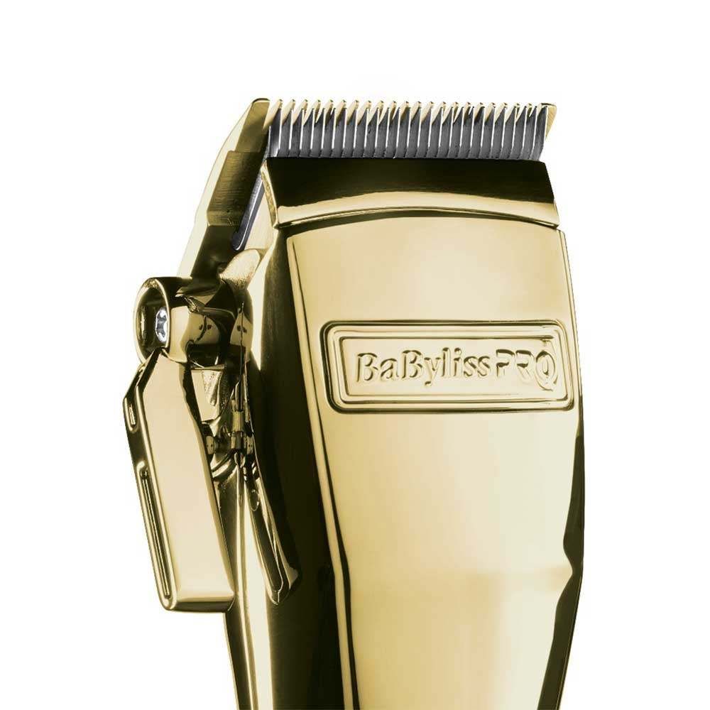 Tagliacapelli dorato. Vista dettagliata delle lame e del logo Babyliss Pro.