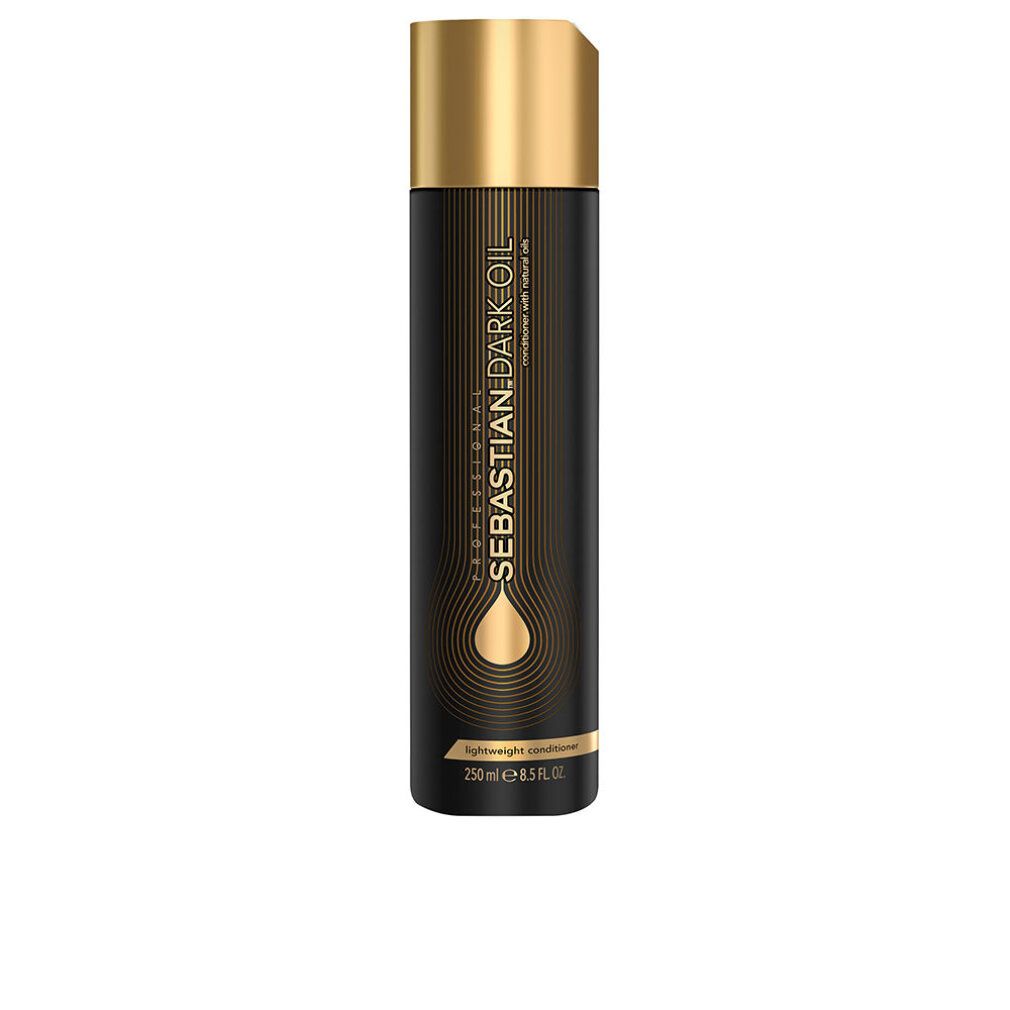 Flacone nero con tappo dorato. Scritta: Sebastian Dark Oil. Contiene 250 ml. Balsamo leggero.