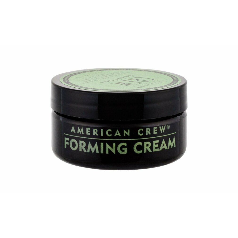 Barattolo nero con coperchio verde. Scritta: American Crew Forming Cream.