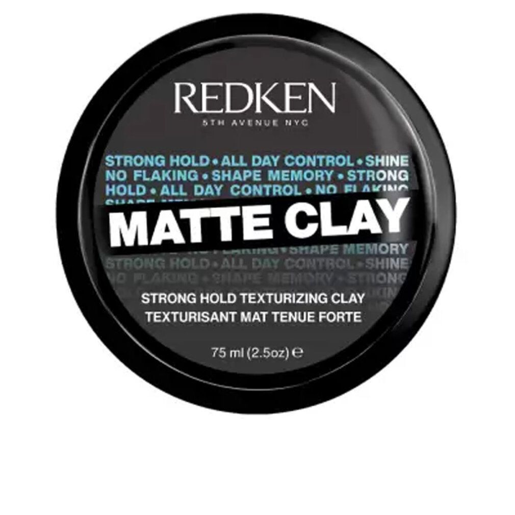 Barattolo nero rotondo con prodotto. Scritta "Redken" e "Matte Clay". Testo: "Strong Hold Texturizing Clay". Volume: 75 ml.