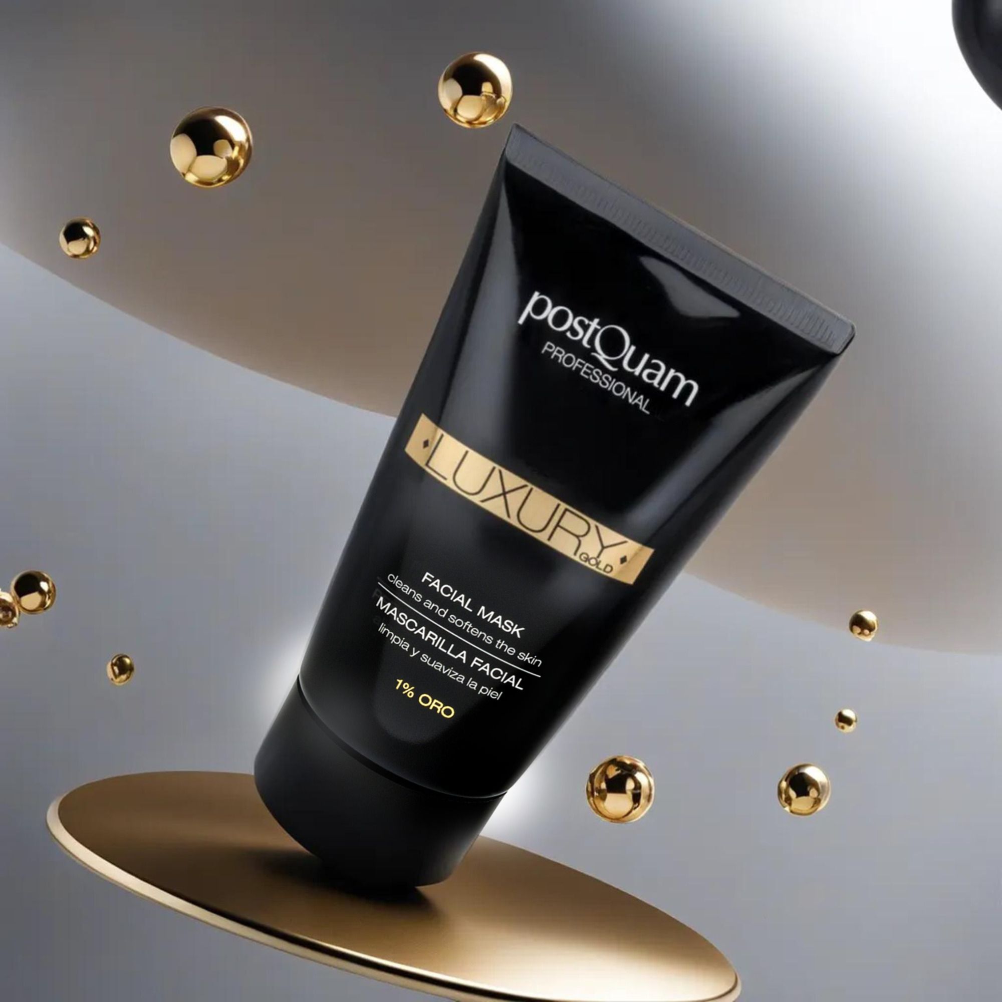 Tubo nero con scritta dorata. Postquam Professional, Luxury Gold, Facial Mask, 1% Oro. Prodotto su piattaforma dorata.