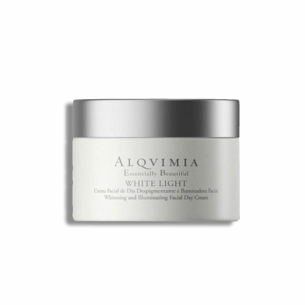 Vasetto di crema con coperchio argentato. Scritta: Alqvimia, White Light. Testo sottostante: Crema Facial de Día Despigmentante e Iluminadora Facial.