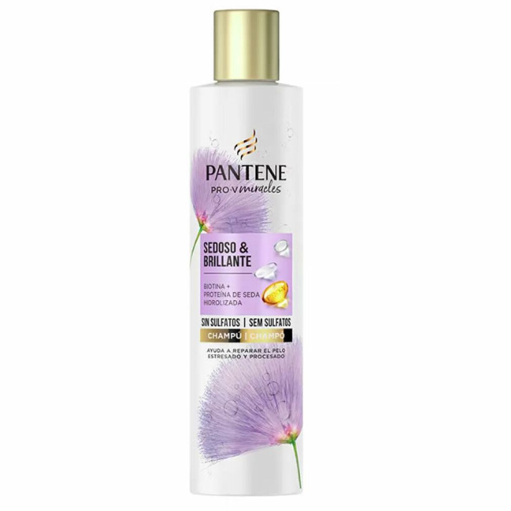 Shampoo bianco con tappo dorato. Scritta: Pantene Pro-V Miracles, Sedoso & Brillante, Champú.