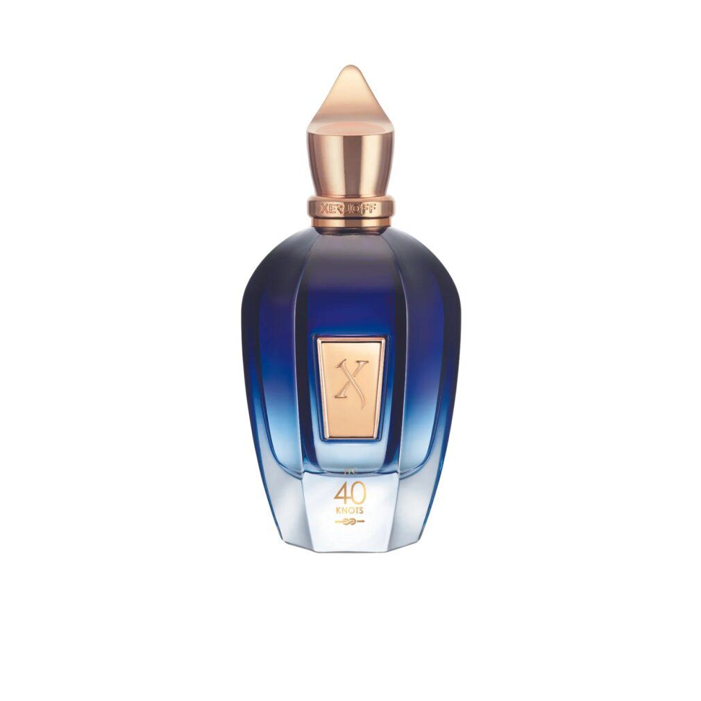Flacone blu trasparente con tappo dorato. Etichetta dorata con 'X' e '40 Knots'.