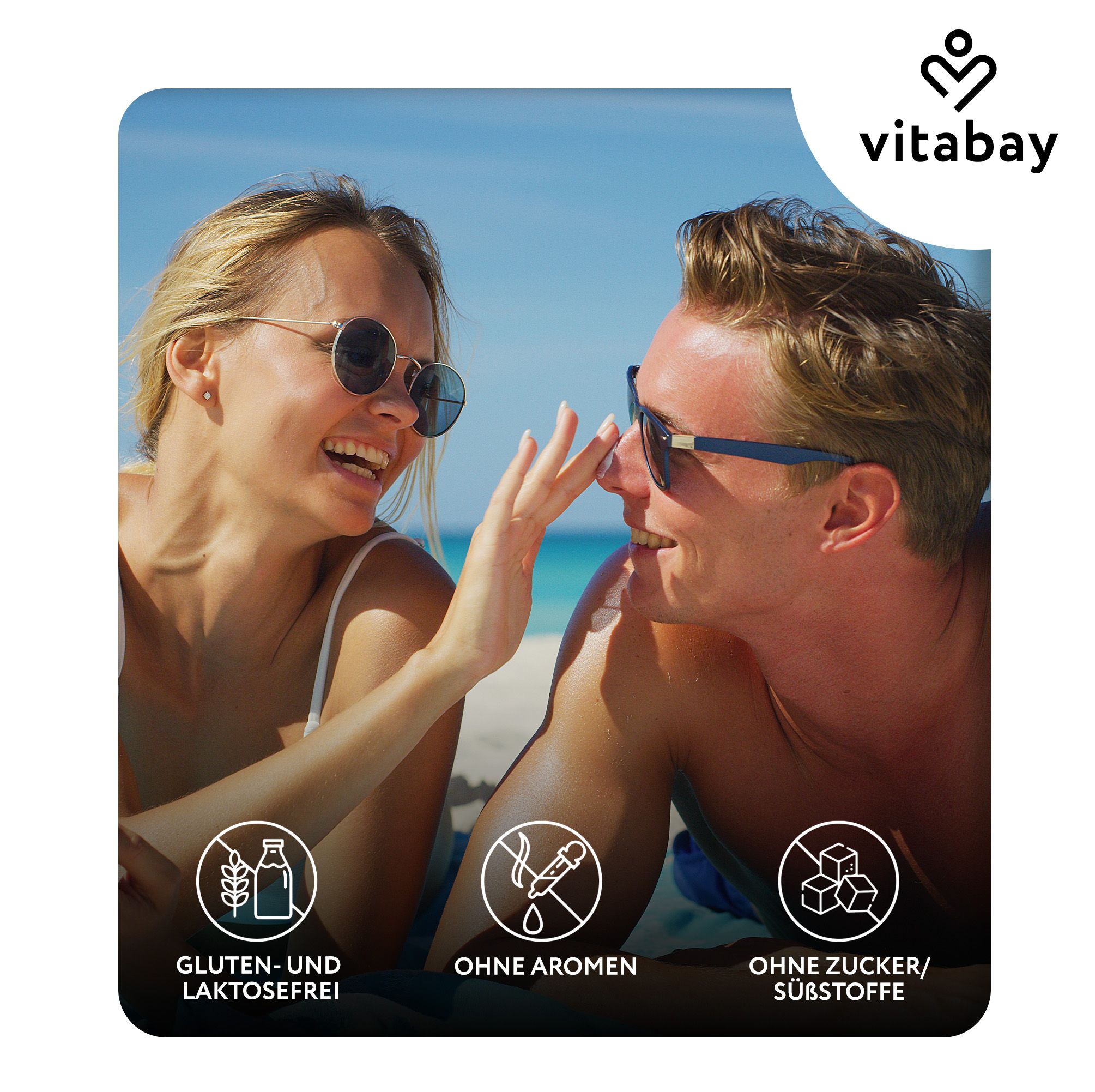 Due persone sulla spiaggia. Testo: Senza glutine e lattosio, senza aromi, senza zucchero/dolcificanti. Marchio: Vitabay.