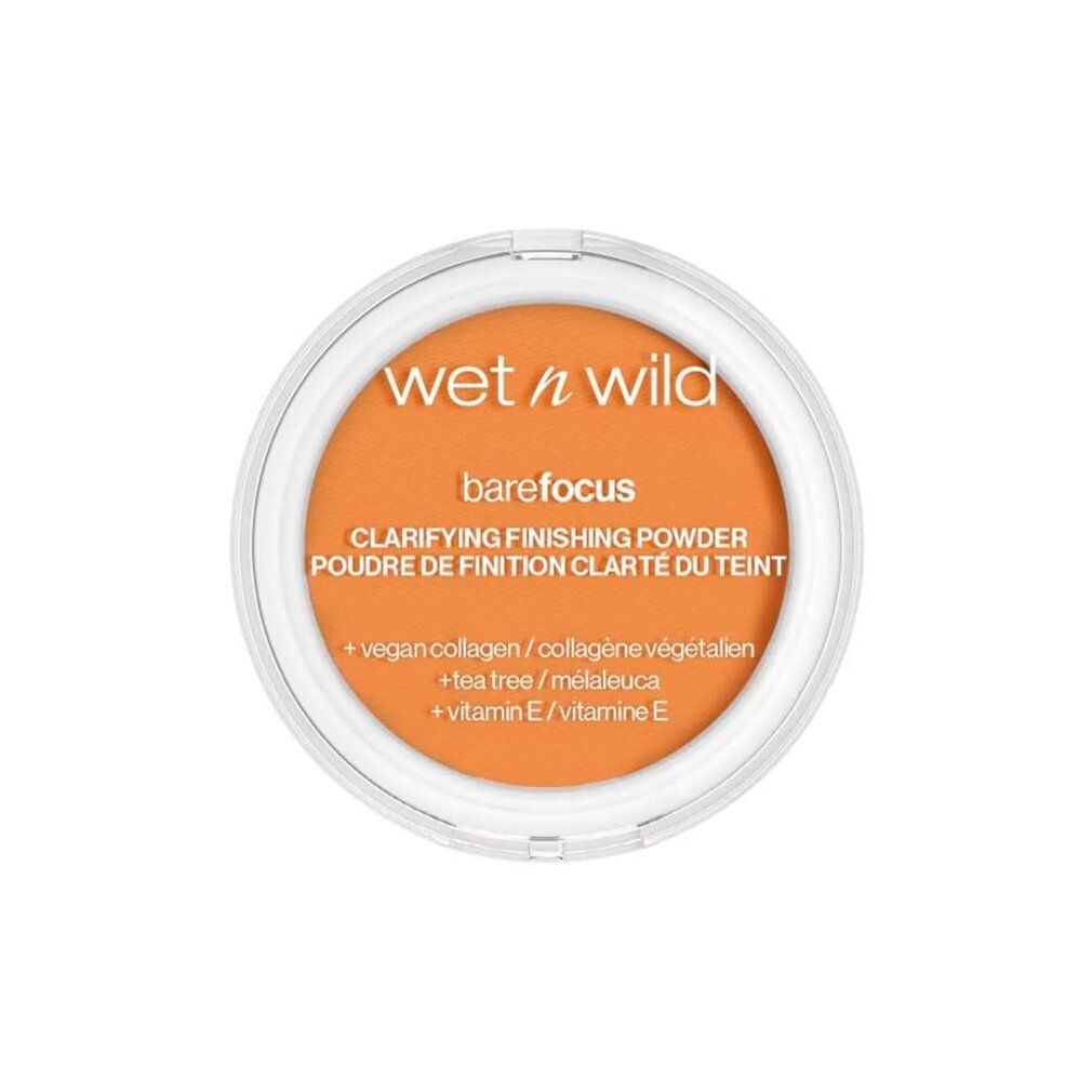 Contenitore rotondo trasparente con polvere arancione. Scritta: Wet n Wild, barefocus, Clarifying Finishing Powder.