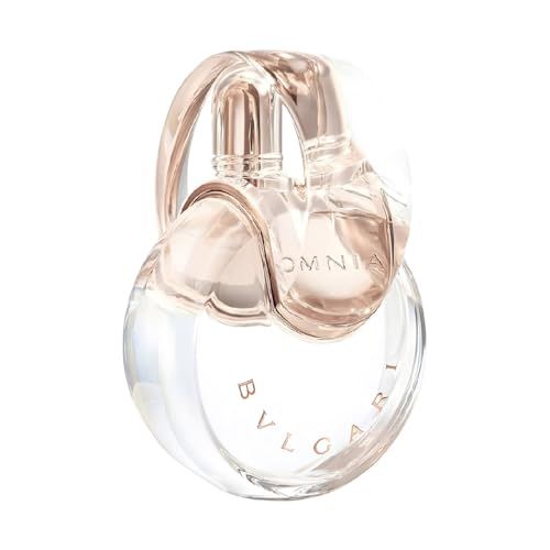 Flacone di profumo in vetro trasparente con accenti rosa. Il flacone ha una forma rotonda con un tappo curvo.
