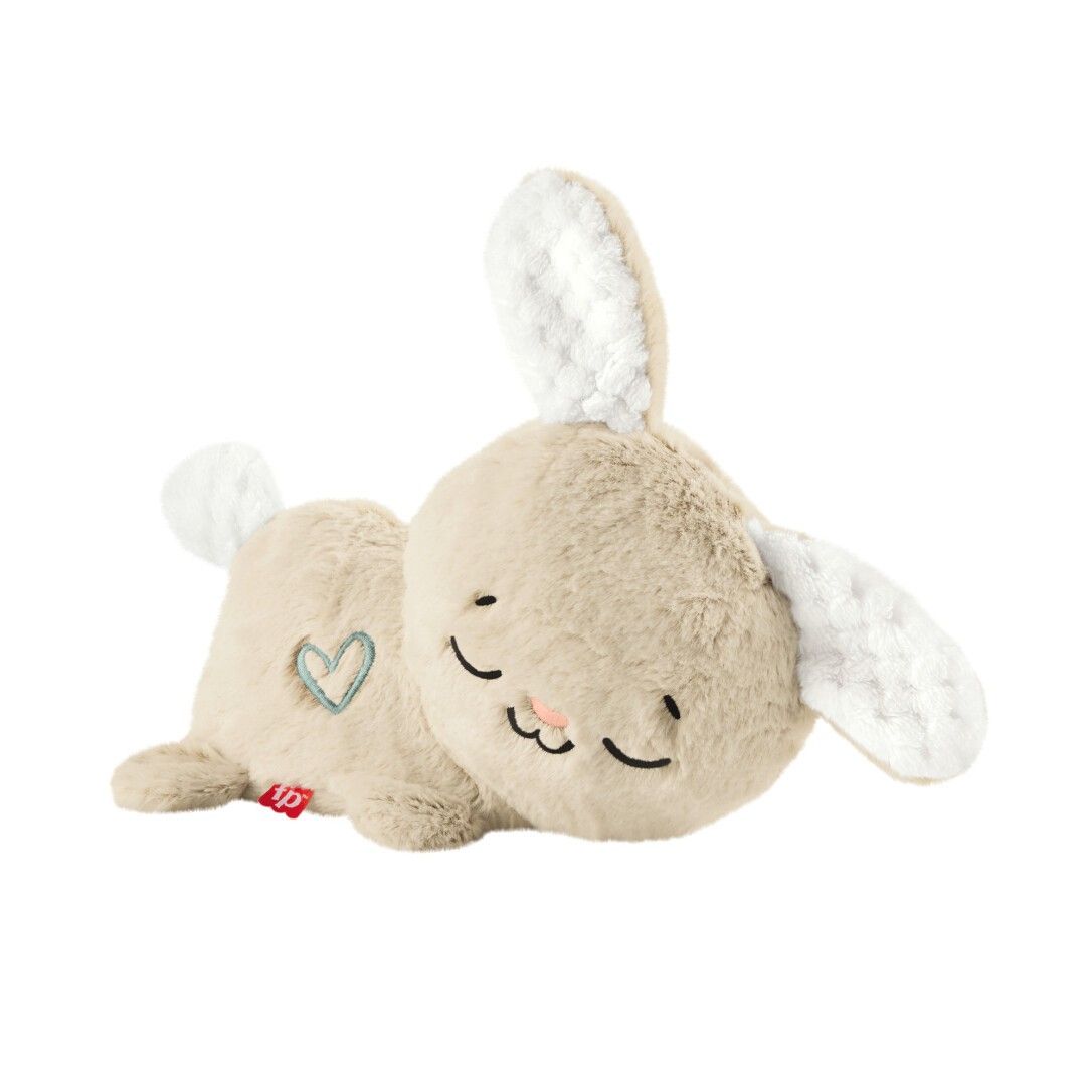 Coniglietto di peluche beige con cuore ed etichetta rossa.