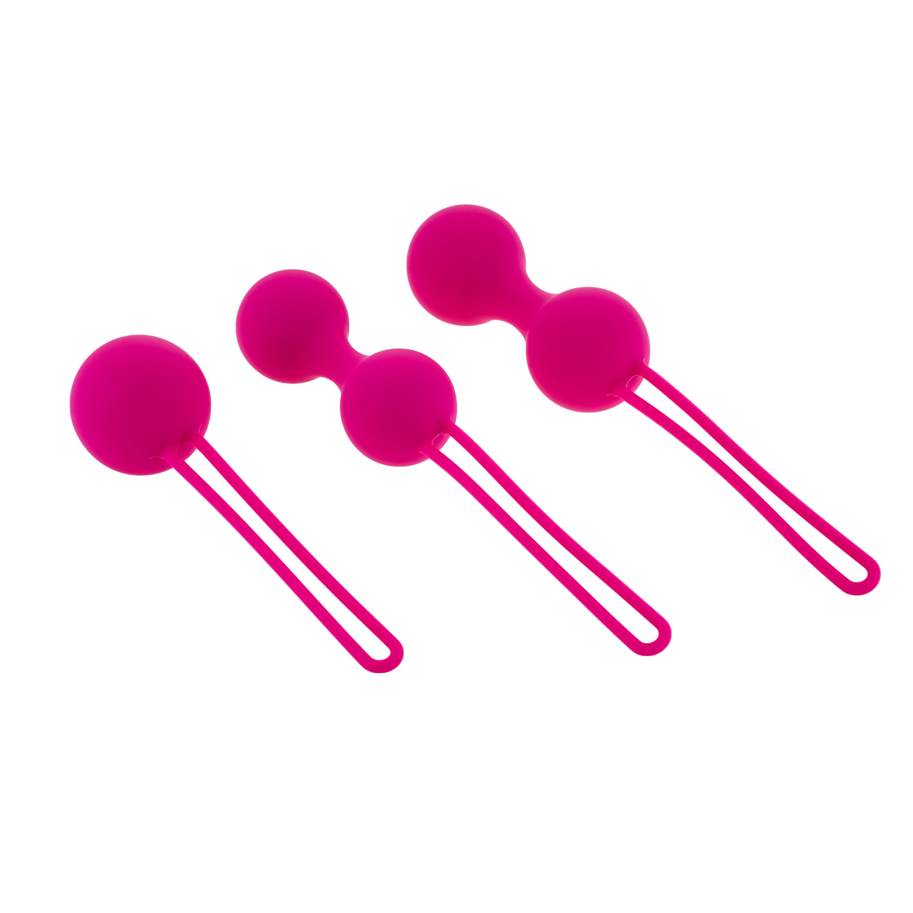 Tre sfere rosa con anelli. Ogni sfera ha una forma rotonda ed è collegata da un gambo sottile.