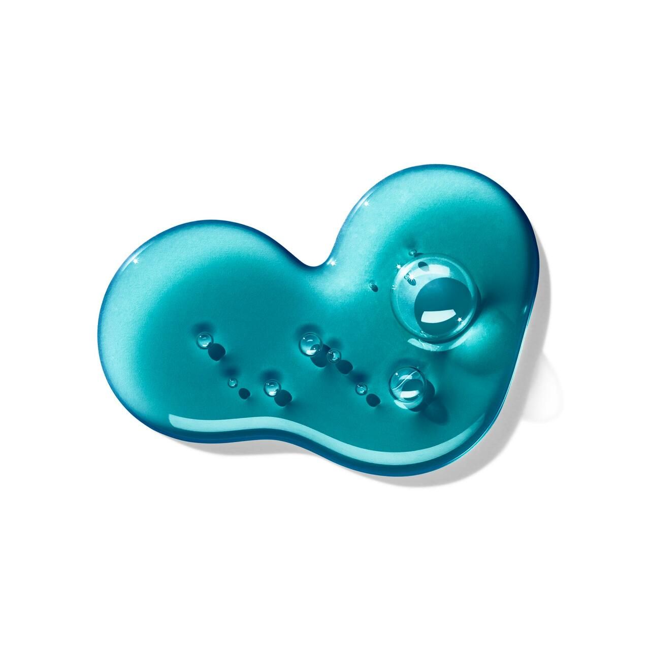 Gel turchese con bolle su sfondo bianco. Consistenza gelatinosa, forma a goccia.