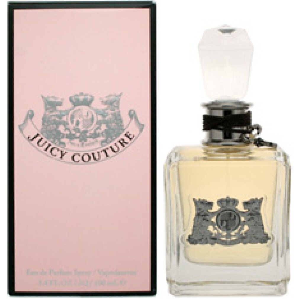 Scatola rosa e flacone di profumo. Flacone con tappo argentato e nastro nero. Logo Juicy Couture.
