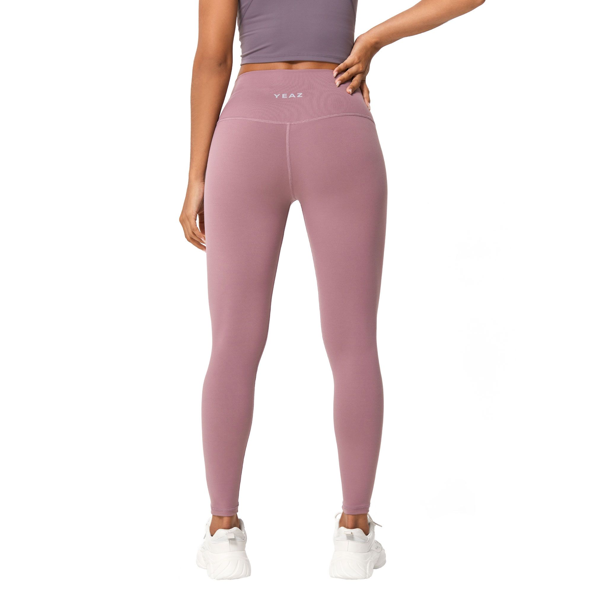 Leggings viola a vita alta con logo bianco in vita.