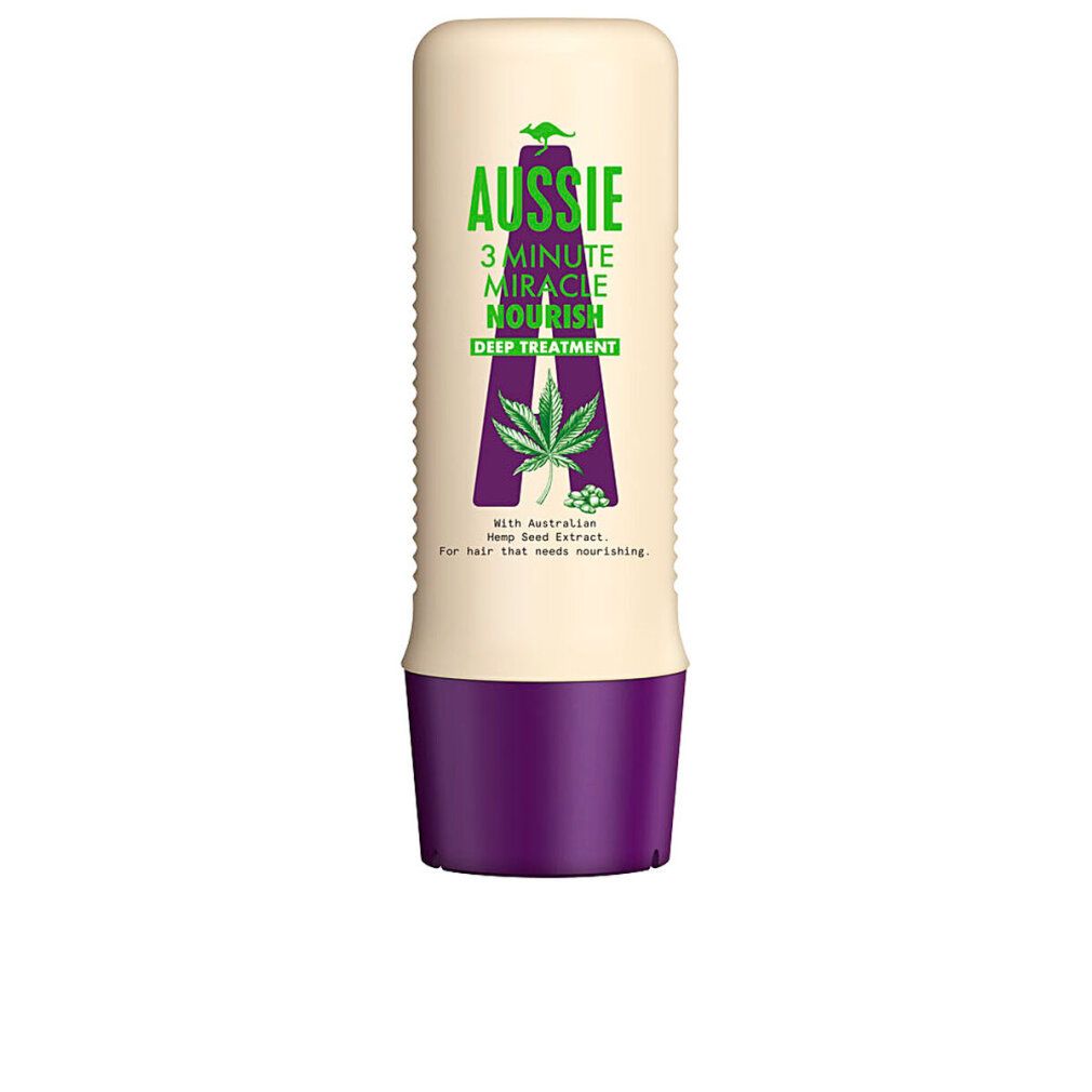 Tubo beige con base viola. Scritta: Aussie 3 Minute Miracle Nourish Deep Treatment. Con estratto di semi di canapa.