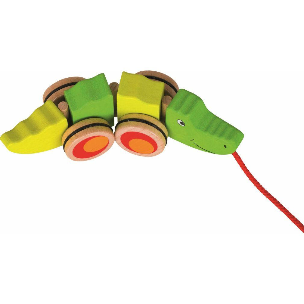 Coccodrillo di legno da tirare, verde e giallo. Ruote con cerchi rossi e arancioni. Corda rossa. Goki.