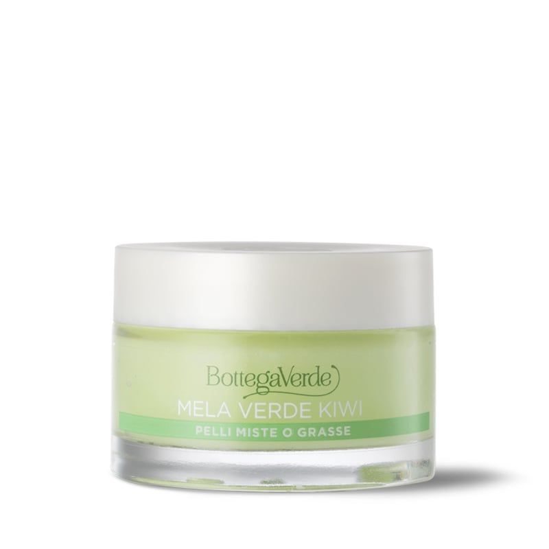 Vasetto rotondo con contenuto verde e coperchio bianco. Scritta: Bottega Verde, Mela Verde Kiwi, Pelli Miste o Grasse.