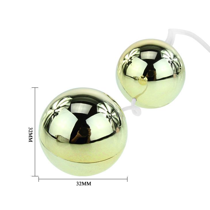 Due sfere dorate, ciascuna di 32mm, collegate da un cordino.