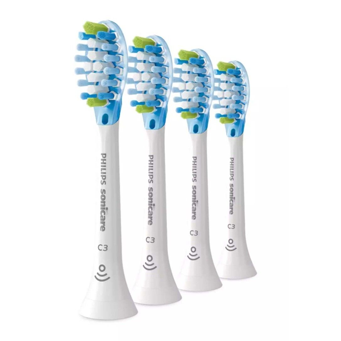 Quattro testine Philips Sonicare C3. Manici bianchi, setole blu e verdi. Loghi C3 e Sonicare visibili.