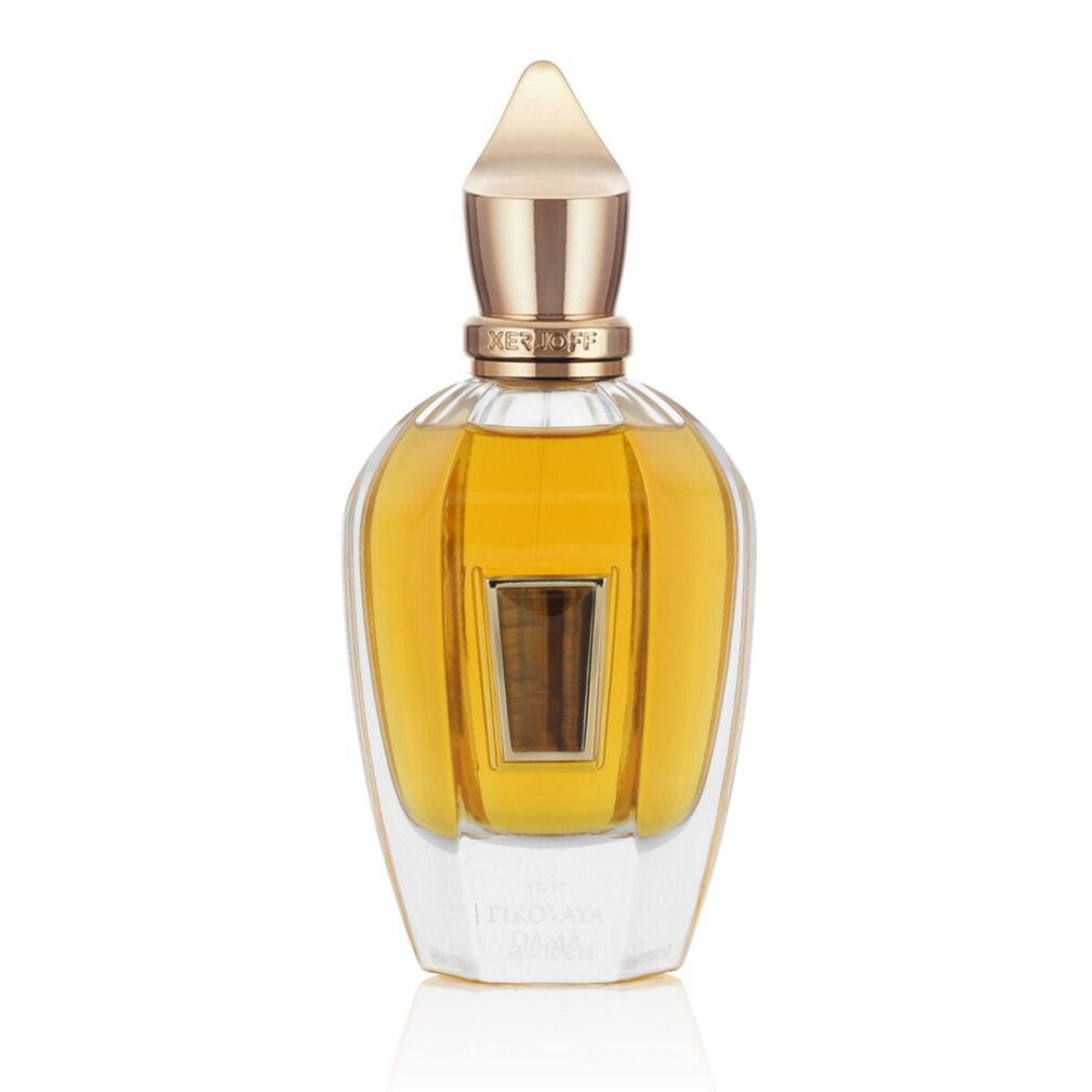 Flacone di profumo. Tappo dorato, contenuto dorato. Flacone con etichetta rettangolare. Scritta: PIKOVAYA DAMA.