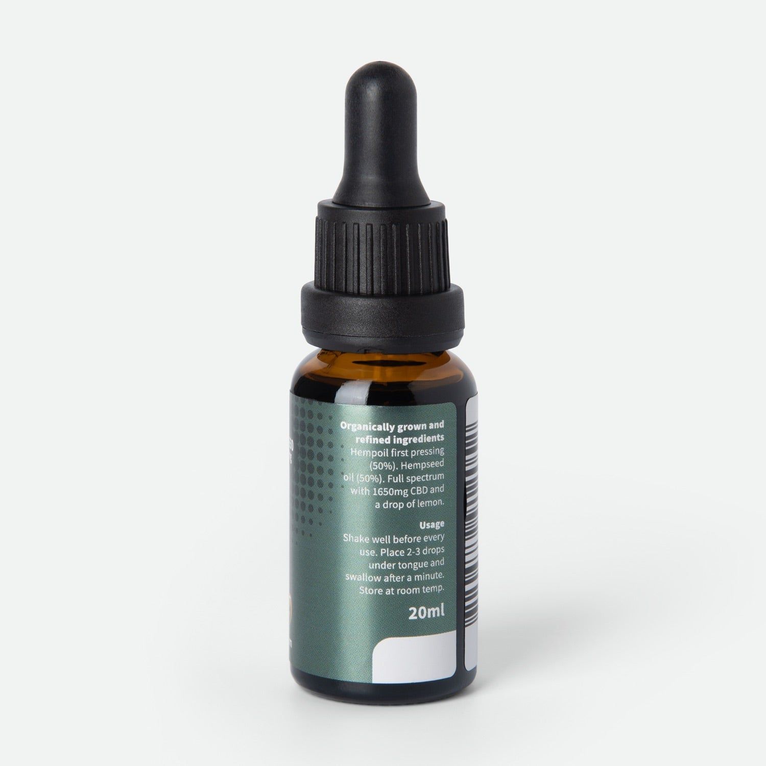 Flacone di vetro marrone con contagocce nero. Etichetta con testo: 'Organically grown and refined ingredients'. 20ml.