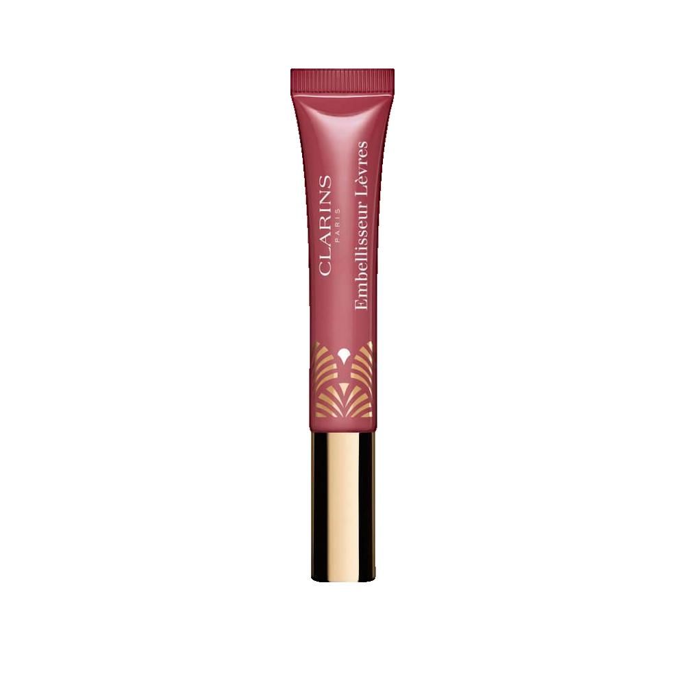 Tubo di gloss rosa con base dorata. Scritta: Clarins Paris, Embellisseur Lèvres.