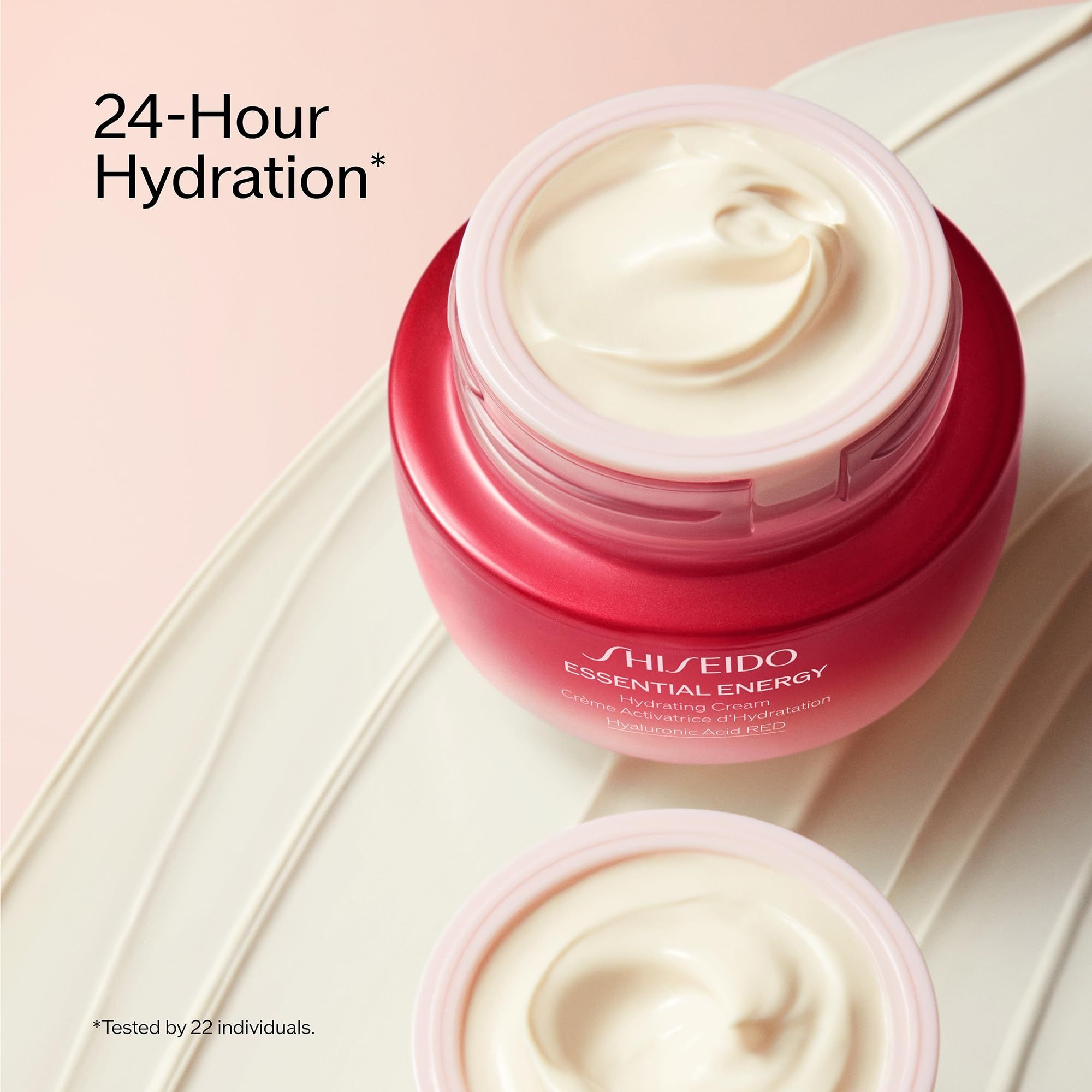 Vaso rosso con crema. Scritta: SHISEIDO ESSENTIAL ENERGY. Idratazione 24 ore.