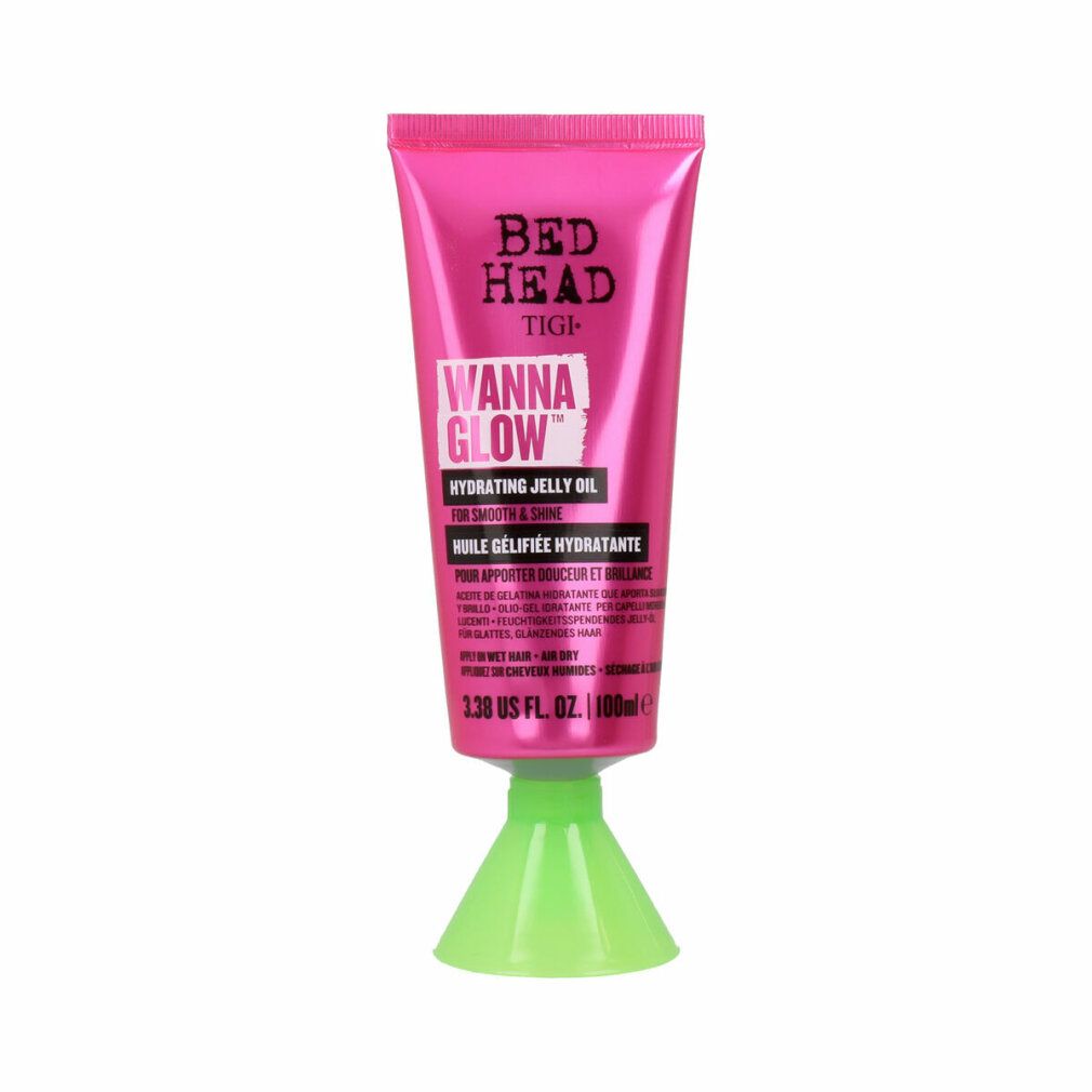 Tubo rosa con base verde. Bed Head Tigi Wanna Glow Hydrating Jelly Oil. Testo in inglese e francese.