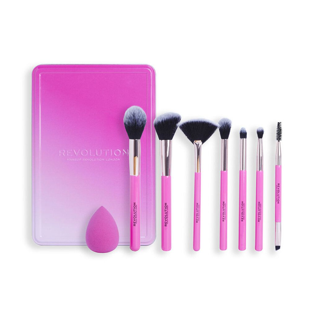 Set di pennelli con manici rosa e spugna, in una scatola rosa e bianca. Include varie forme di pennelli.