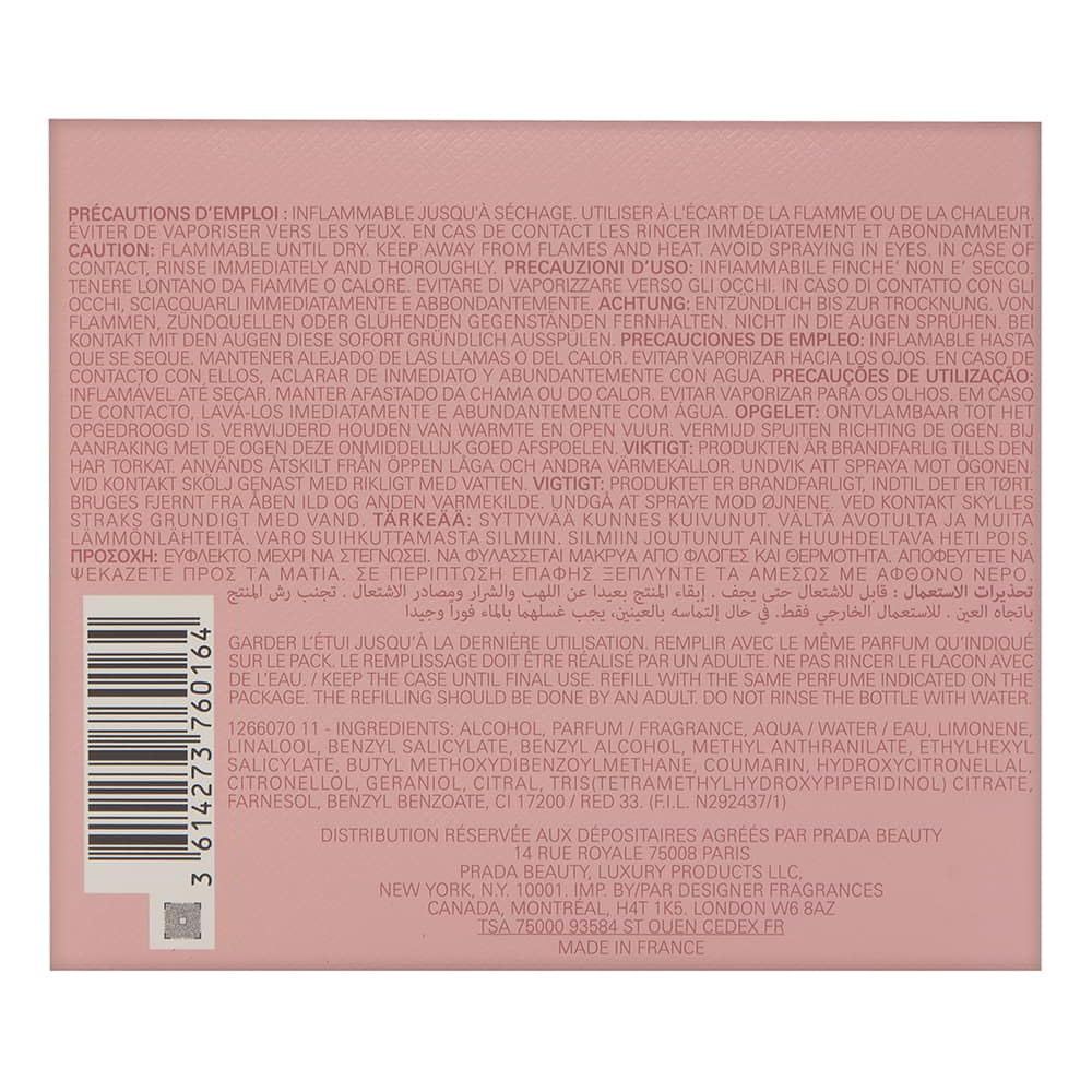 Retro della confezione rosa. Testo multilingue, codice a barre e informazioni sul produttore.