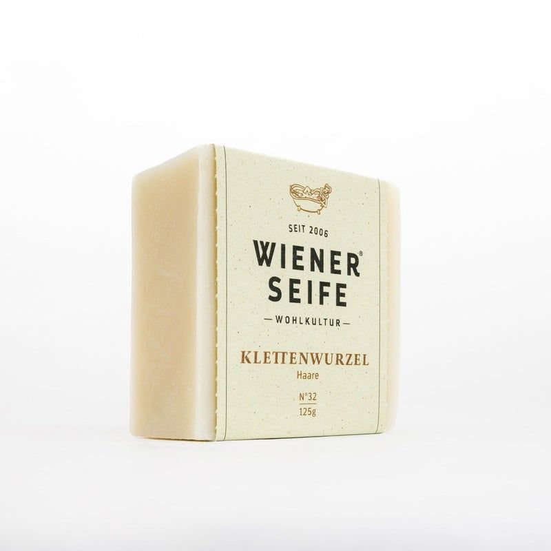 Sapone rettangolare con fascia di carta. Scritta: Wiener Seife, Klettenwurzel, N°32, 125g.