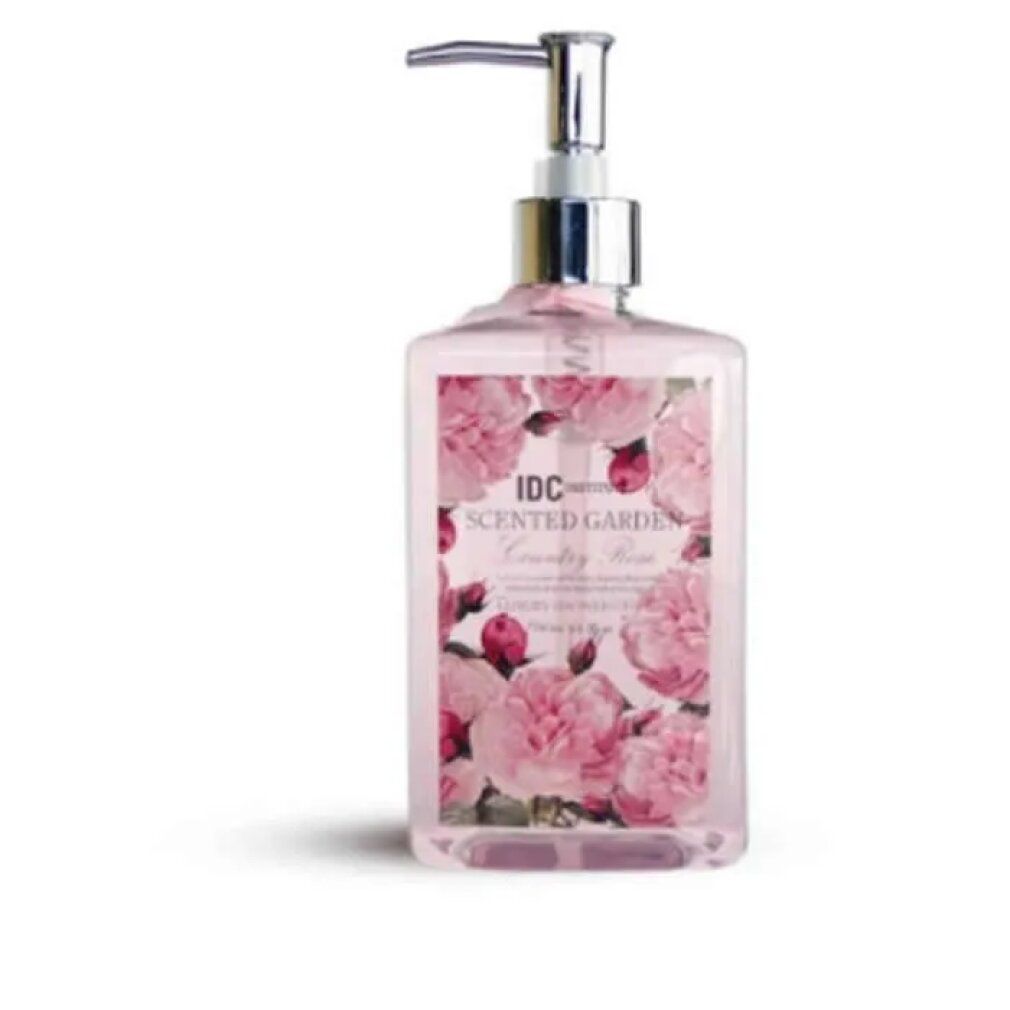 Flacone trasparente con motivo floreale e dispenser argento. Scritta: IDC INSTITUTE Scented Garden.