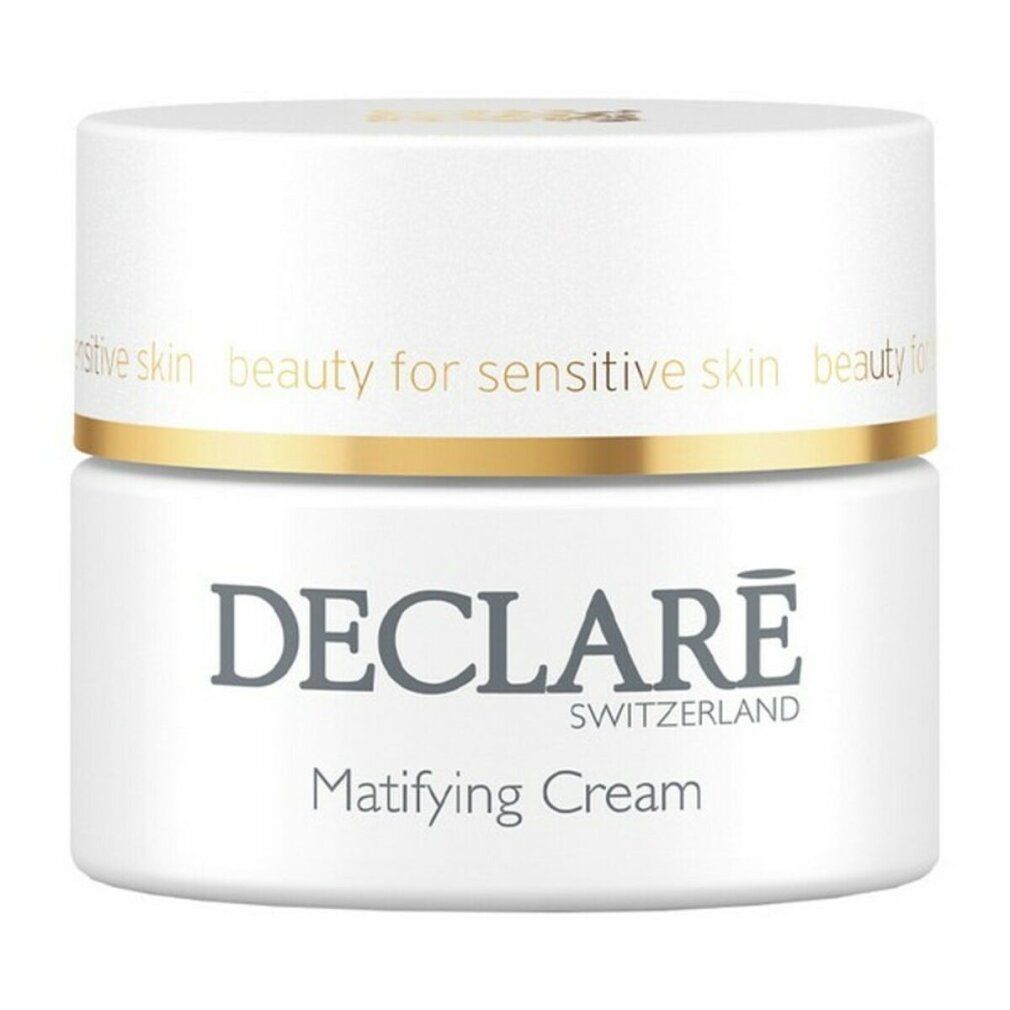Vasetto bianco con anello dorato. Scritta: DECLARÉ SWITZERLAND, Matifying Cream. Testo: beauty for sensitive skin.